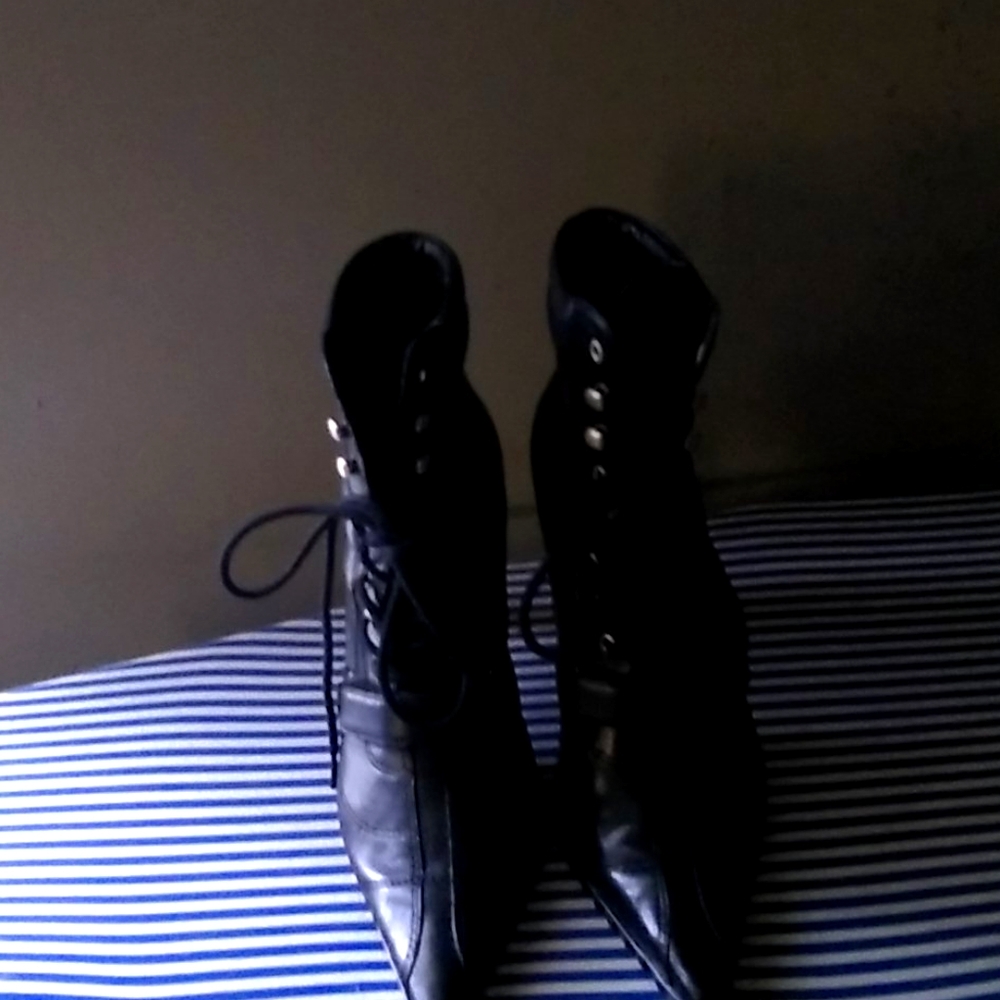 Women's Nine West high heeled ankle boots.